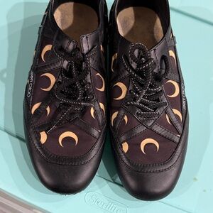 Jimmy Choo Black Leather Sneakers with Tan Crescent Moon Print